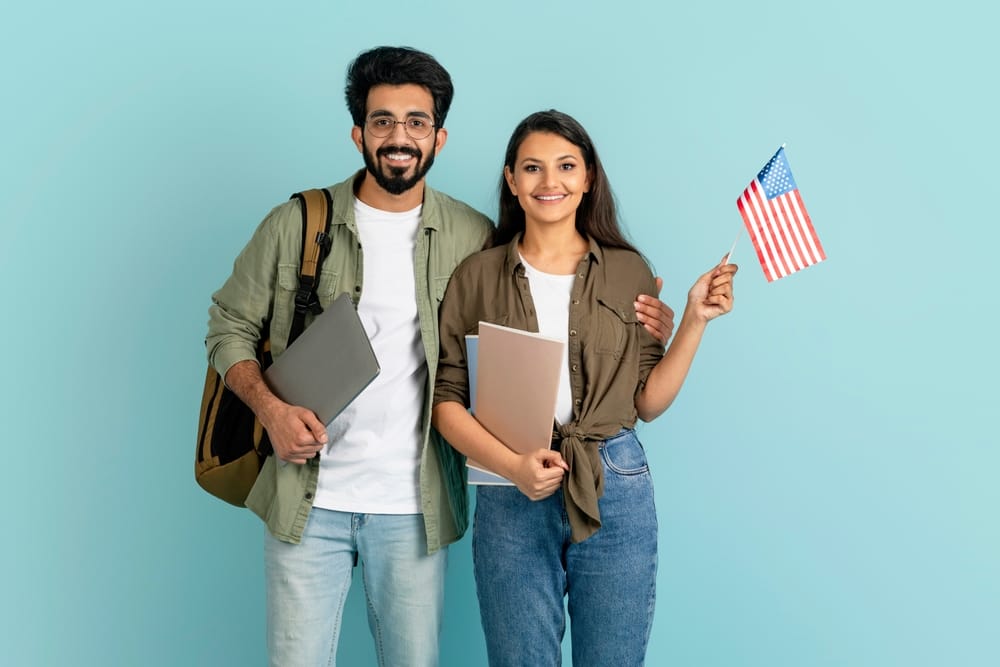 Cheerful happy beautiful multiethnic millennial couple arab man indian woman students with backpack